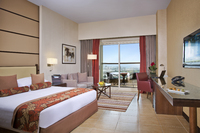 Guest Room with King Bed and Balcony.