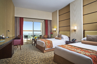 King or Twin Beds with Balcony.