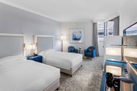 Guest Room with Twin Beds and Balcony.