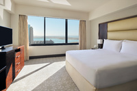 Refined suites with Abu Dhabi views.