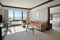 Refined suites with Abu Dhabi views.