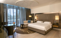 Experience refined luxury in a spacious room.