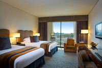 Twin Bedroom with Balcony and Private Bathroom.