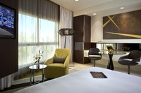 KIng Bedroom with Large Windows.