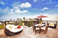 King bed and private terrace with sun loungers.