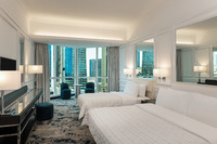 Panoramic skyline view, king bed.