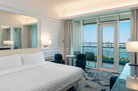 King bed, balcony, VIP amenities.
