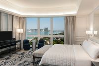 King bed, balcony, VIP amenities.
