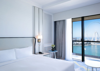 King size bed, private balcony, and front sea view
