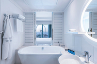 King size bed, private balcony, and front sea view