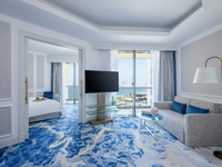 2 private balconies with side sea view.