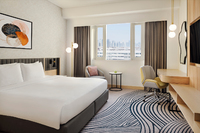 Premium Room with King Bed and amenities.