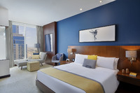 Deluxe rooms, panoramic Dubai views."