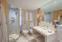 Panoramic views, modern style, deluxe amenities.