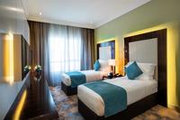 Spacious, twin beds, modern amenities.