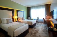 Luxurious contemporary twin room accommodations.