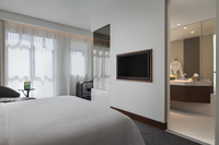 Deluxe room, king bed, city view.