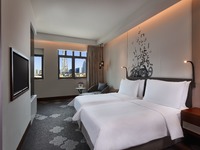 Deluxe room, two twin beds, Burj view.