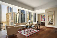 King Bed with Amenities, Balcony, and Burj View.
