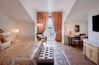 Spacious suite with stunning city views.
