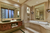 Luxurious suite with terrace and skyline view.