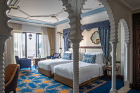 Elegant room with Arabian Gulf views.