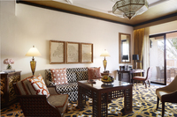 Luxurious suite with canopied bed.
