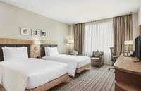 Modern amenities with comfortable bedding.