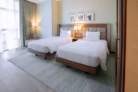 Stylish twin room, modern comforts.