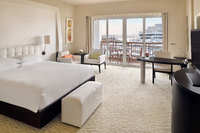 Spacious skyline-view balcony room.