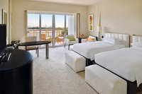 Spacious skyline-view balcony room.