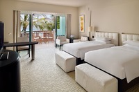 Elegant lagoon-view balcony room.