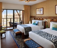 Twin room, amenities, view.