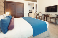 King bed, kitchenette, modern amenities.