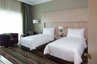 Luxury bed, high-tech amenities, snacks.