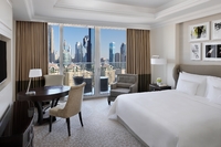 King bed, balcony, city views.