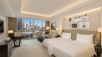 Twin beds, balcony, city views.