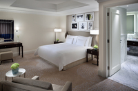 King suite with city views, balcony.