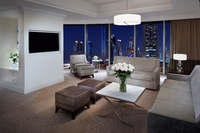 King suite with city views, balcony.
