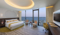 Partial sea view, king beds.