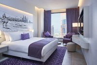 Luxurious suite offering captivating city vistas.