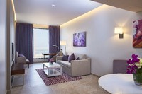 Luxurious suite offering captivating city vistas.
