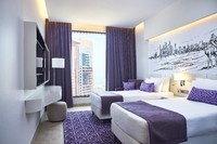Elegant suite with skyline views.
