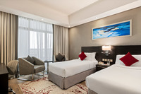 Spacious room with racecourse views.