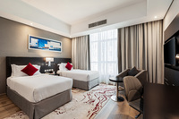 Contemporary room with king or twin beds.