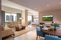 Spacious suite, king bed, city views.