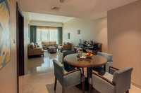 Spacious suite, king bed, city views.