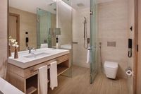 Separate shower/bath and private balcony.