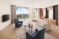 King bed, balcony, & separate living area