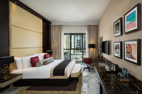 Elegant room, city views, luxurious comfort.